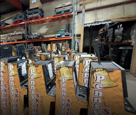 Skill machine cabinets stacked in a warehouse